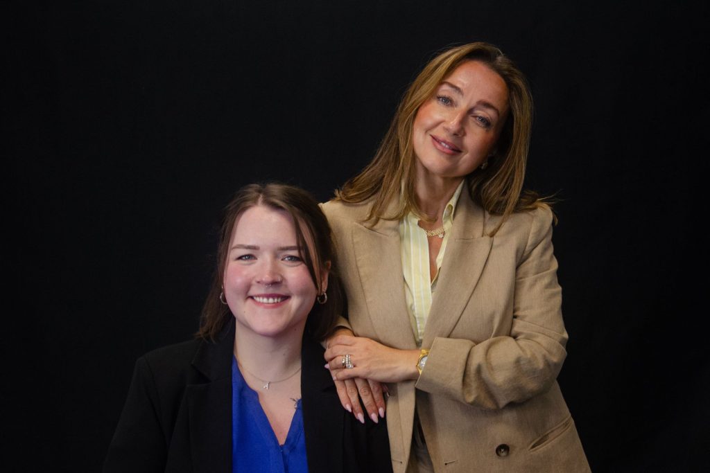 Tatiana and Abby of Mailstar leadership, portrait on a black background
