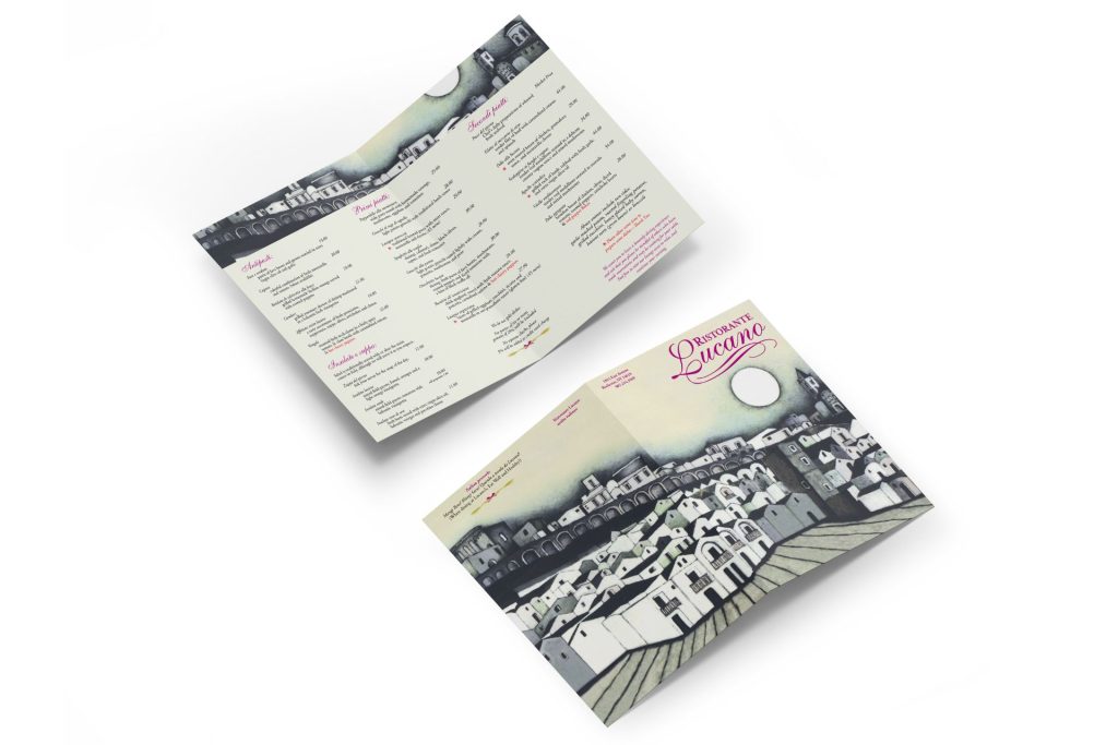 Folded restaurant menus with illustrated cityscape artwork